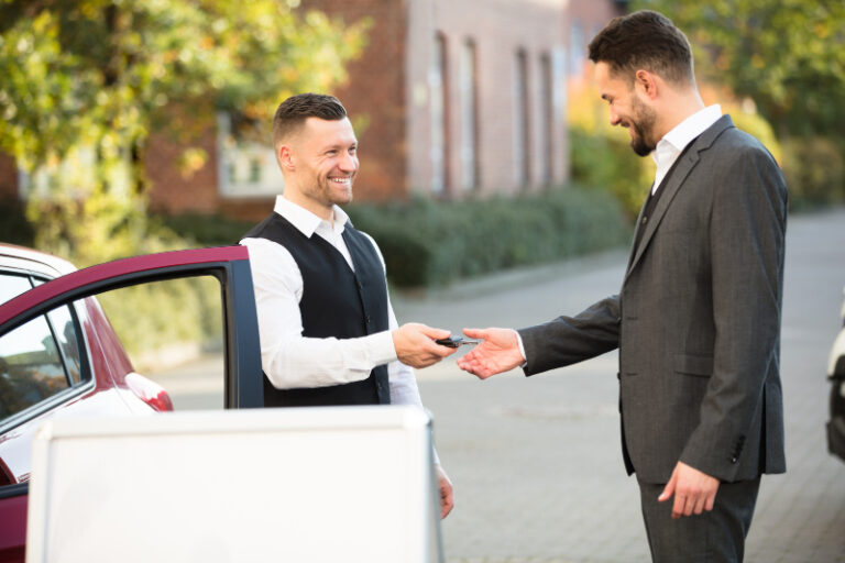 A car being safely driven by a valet